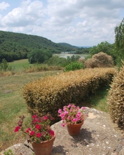 Enduit terre-paille-chaux-sable sur mur en pierre à Siccieu (Isère)